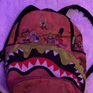 Sprayground Orange and Black Kids backpack,